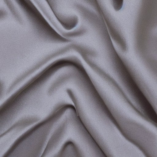 Close-up of light gray polyester fabric showing soft folds and smooth texture